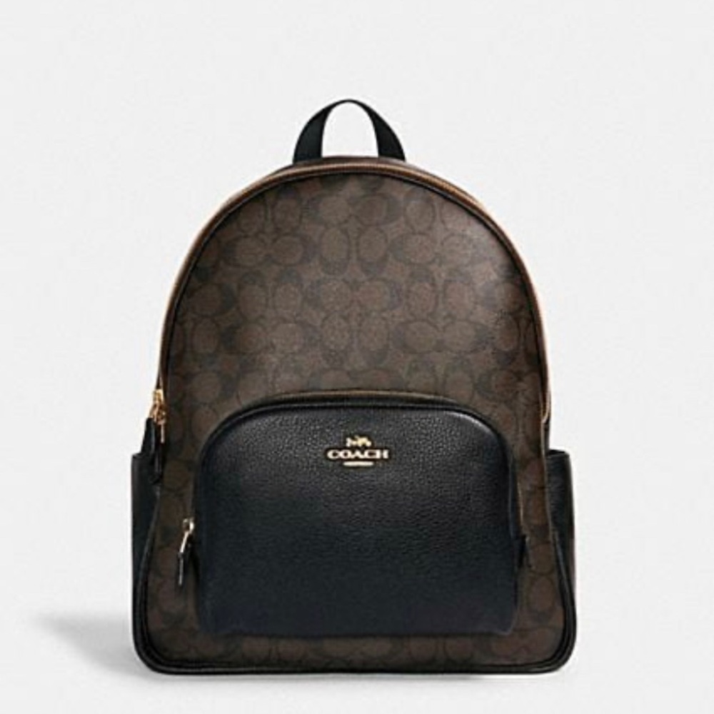 I am selling a coach book bag was a gift only used once and in great condition
